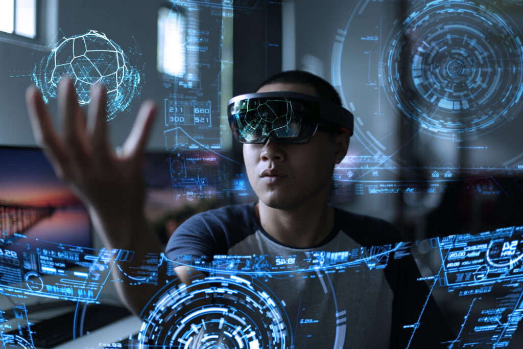 A male student using virtual reality to learn