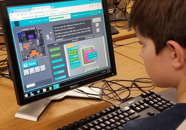 A student using an interactive coding platform